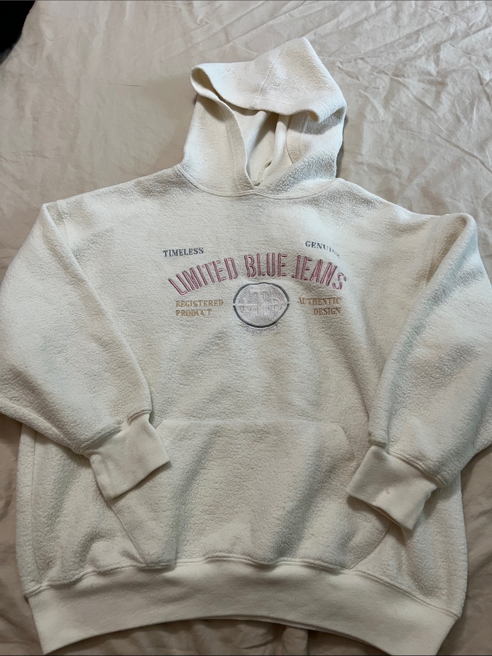 The Limited Cream Hoodie with Navy Tag and Red Stars